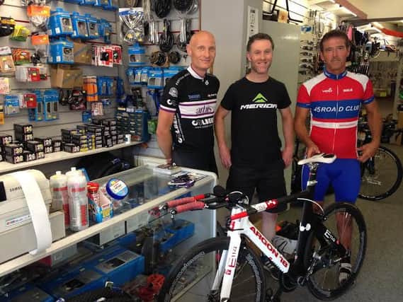 Neil Barford and Kev Hardwick are taking part in a 2,200 race around Ireland. Pictured with Stuart Burke (centre) owner of Newlec cycles in Northampton