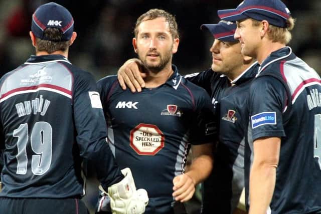 MAGICAL MEMORY - Steven Crook is congratulated after claiming a wicket in the 2013 T20 final win over Surrey