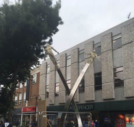 A wayfinding sign could be placed by the Francis Crick memorial in Abington Street.