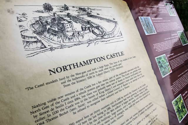 A Northampton Castle sign information board at the site of the old Northampton Castle near Black Lion Hill.