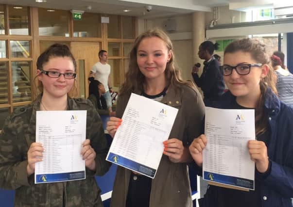 Malcolm Arnold pupils celebrating their GCSE results this morning.