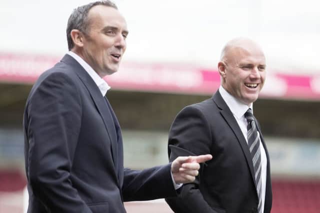 Cobblers chairman Kelvin Thomas (left) and manager Rob Page