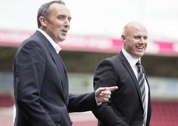 Cobblers chairman Kelvin Thomas (left) and manager Rob Page