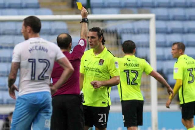 SUSPENDED - John-Joe O'Toole picked up his fifth booking of the season against Coventry City