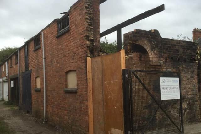 The garage used as a storage space by TK&S Optometrists in Kingsley Road, Northampton