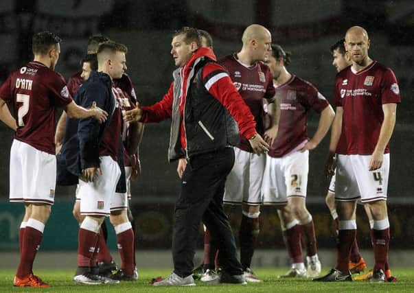 Karl Robinson brings his Milton Keynes Dons team to Sixfields for the first time since the teams' 2-2 FA Cup draw in January