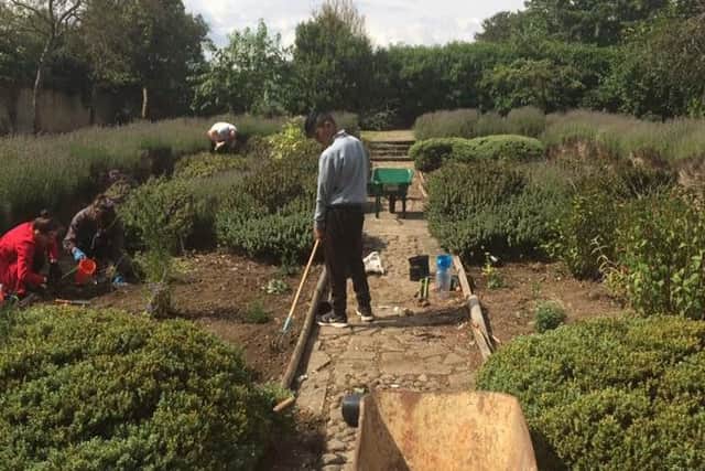 The teenagers working at Grendon Outdoor Centre as part of the National Citizen Service (NCS) scheme