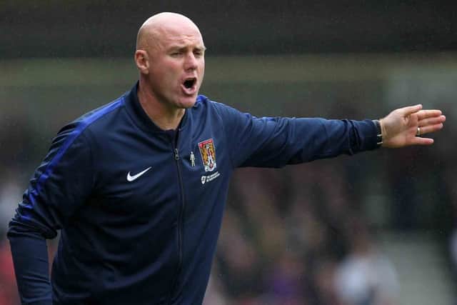 Rob Page gives out instructions from the touchline on Saturday. Picture: Sharon Lucey