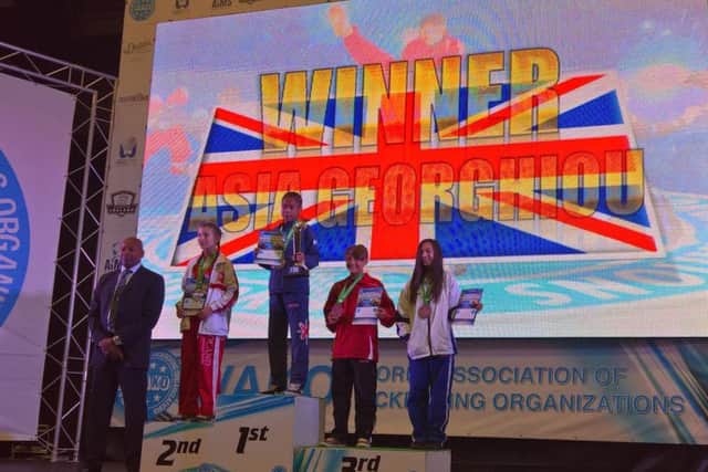 Asia picks up her medal at the Wako Junior World Kickboxing Championships in Dublin