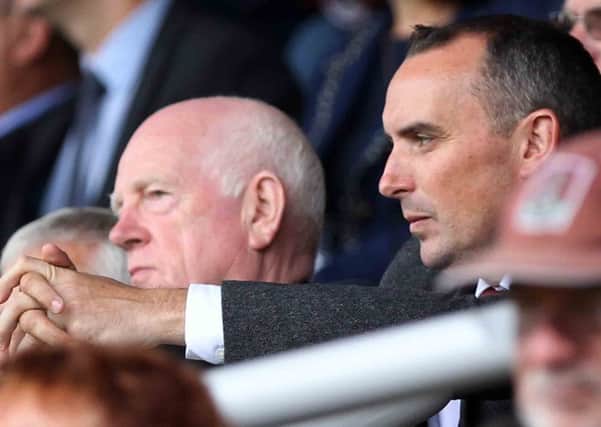Chairman Kelvin Thomas watches the Cobblers beat Walsall on Saturday