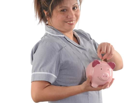 An image of an NGH nurse with a symbolic piggy bank, which was used in the recruitment campaign