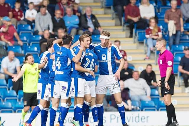 Chesterfield's players celebrate their opening goal