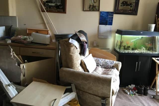 An elderly man was sitting in his armchair when a car crashed into a wall of his bungalow