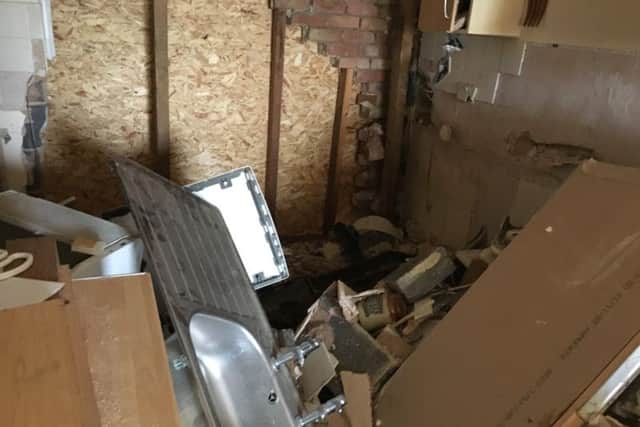 A man who lives in the bungalow was luckily unharmed by the crash