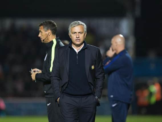 SPECIAL NIGHT: Jose Mourinho prowls the touchline at Sixfields. Pictures: Kirsty Edmonds