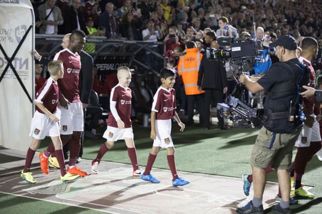 Gabriel Zakuani steps out of the tunnel at Sixfields. Pictures: Kirsty Edmonds