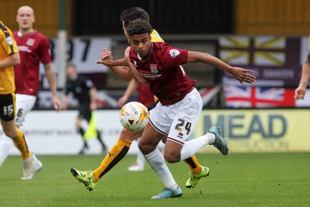 Swindon full-back Darnell Furlong played 11 games whilst on loan at Northampton last season