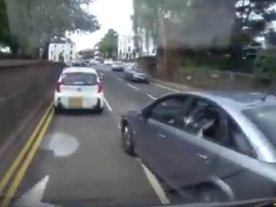 Footage shows the moment a car darts in front of a van in Northampton causing a minor collision.