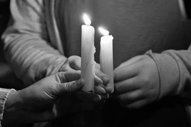 Candlelit vigil outside home of David Brickwood on one-year anniversary of his murder NNL-160926-220604009