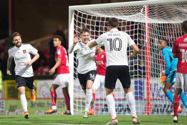 Harry Beautyman celebrates his goal at Swindon