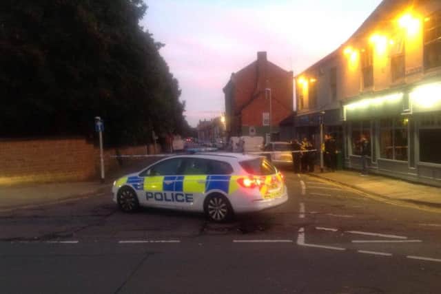 An eyewitness captured police cordoning off an area by the Fiddlers pub in Wellingborough Road last night.