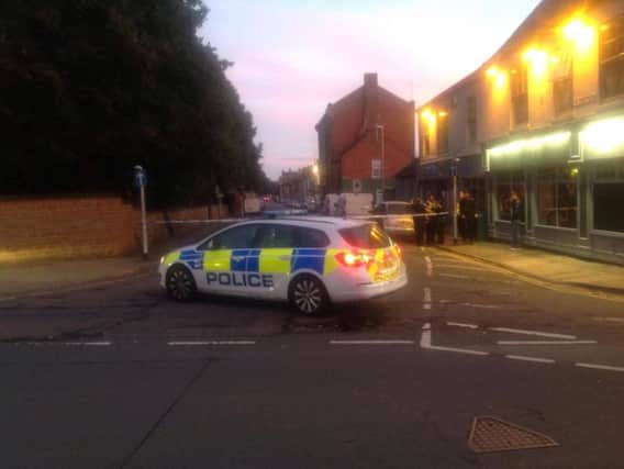 An eyewitness captured police cordoning off an area by the Fiddlers pub in Wellingborough Road last night.