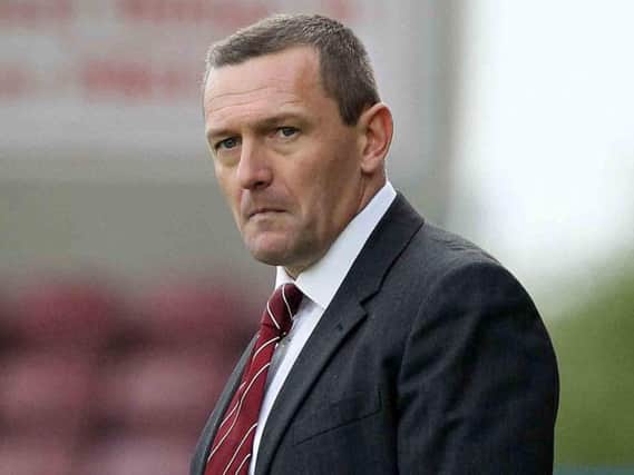 Former Cobblers boss Aidy Boothroyd will take temporary charge of the England Under-21s