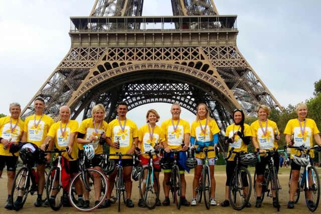 The cyclists at their final destination in Paris