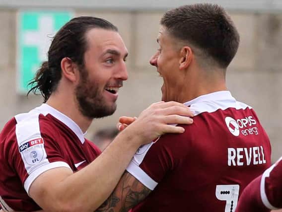 ALL SMILES - John-Joe O'Toole celebrates with Alex Revell following his goal in Saturday's 4-0 win over Southend United (Picture: Sharon Lucey)