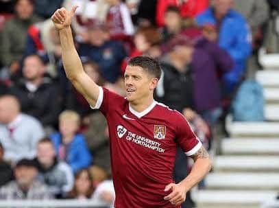 Alex Revell celebrates his first goal