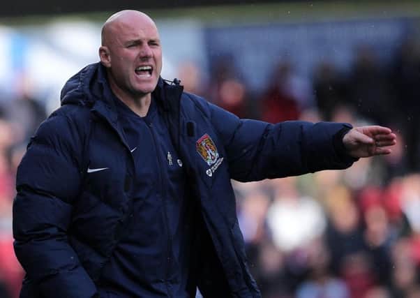 OFF DAY - Cobblers boss Rob Page watches his team slump to their first home league defeat of the season aginst Bristol Rovers (Picture: Sharon Lucey)