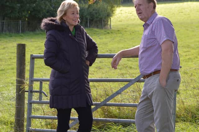 The Secretary of State for Environment, Food and Rural Affairs, Andrea Leadsom, with farmer David Banner during a visit to South Northamptonshire