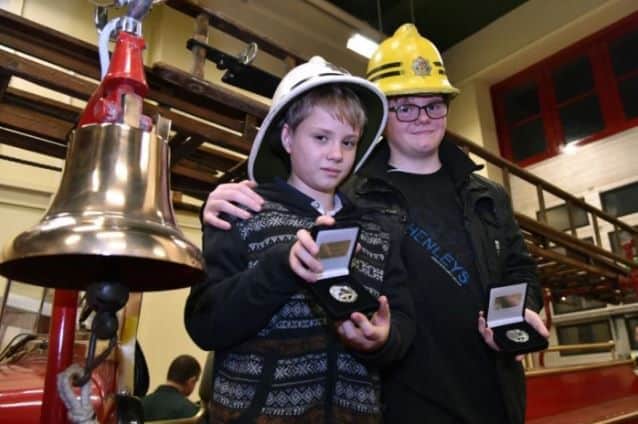 James Scott, aged 15, with his brother Liam, aged 11
