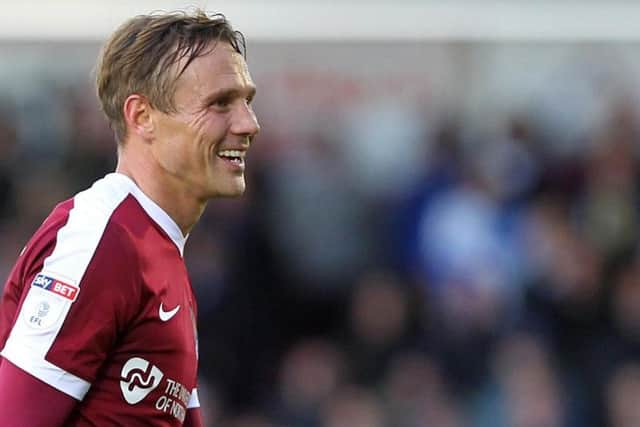 Cobblers midfielder Matt Taylor