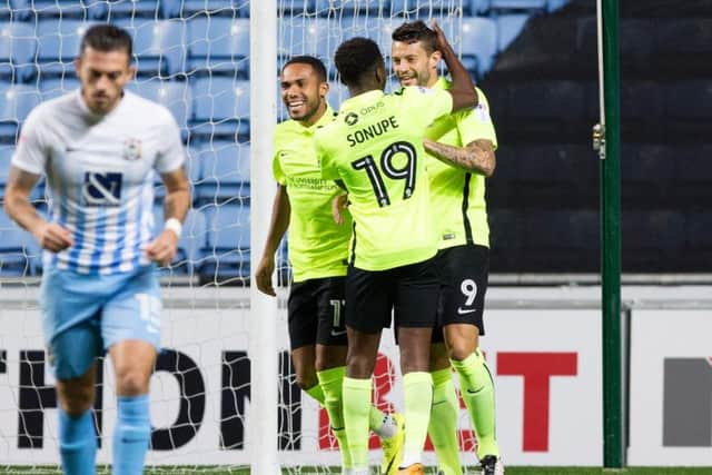 50-UP - Marc Richards celebrates scoring for the Cobblers at Coventry, the striker's 50th goal for the club (Pictures: Kirsty Edmonds)