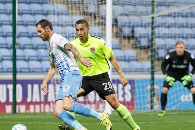 Rod McDonald in action for the Cobblers at Coventry