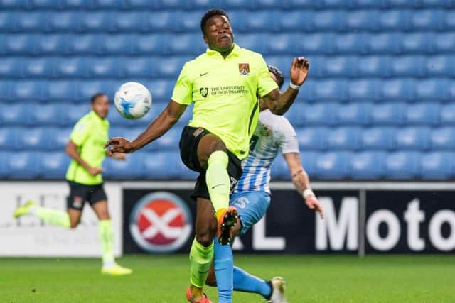 JJ Hooper battles for possession