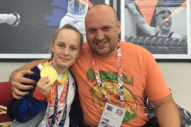 Ellie and coach Andy.