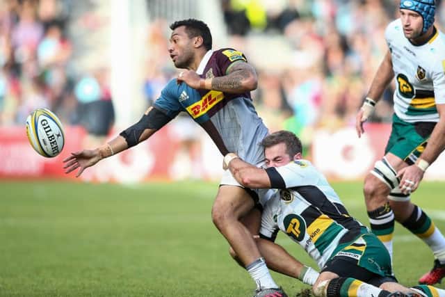 Stephen Myler tried to get to grips with Quins