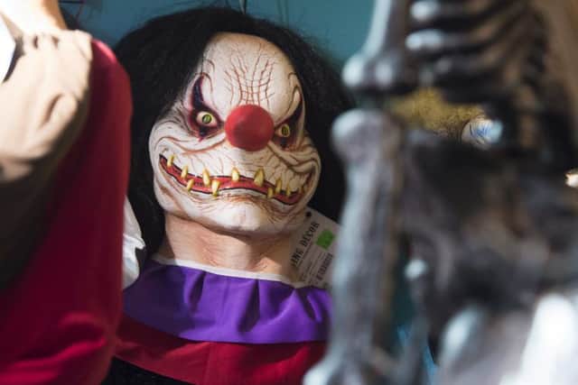 Dozens of incidents involving "killer clowns" have been reported across Britain, with police warning that people caught clowning around will face arrest. (Photo credit: Saul Loeb/AFP/Getty)