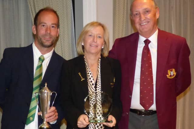 CHAMPIONS - Collingtree Park beat Kettering in the Intermediate final. Pictured are Neil Abery and Catherine Tyldesley from Collingtree and 
Northamptons Laurence Walters