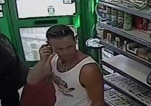 An image has now been released after a theft of a purse from a shop in Wellingborough Road, Northampton.