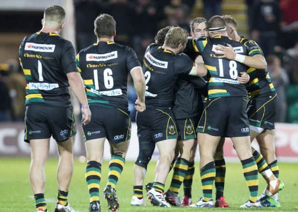 Stephen Myler was mobbed by his team-mates after landing the match-winning kick (pictures: Kirsty Edmonds)