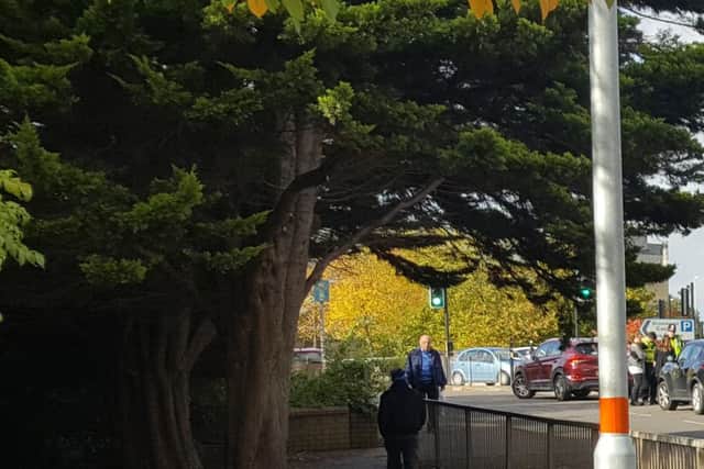 A man is being treated after an incident at the pelican crossing in Wellington Street.