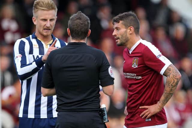 IN THE THICK OF IT - Marc Richards had a goalscoring impact when coming off the bench in Saturday's defeat to Millwall (Picture: Sharon Lucey)
