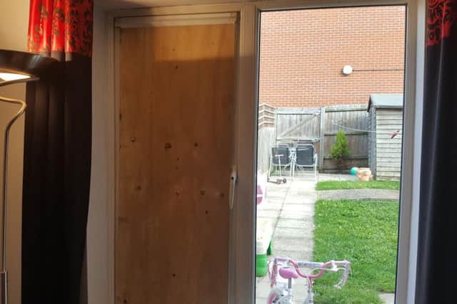 Robbers held a woman and her two children at knife-point after breaking in to a Northampton house through a window