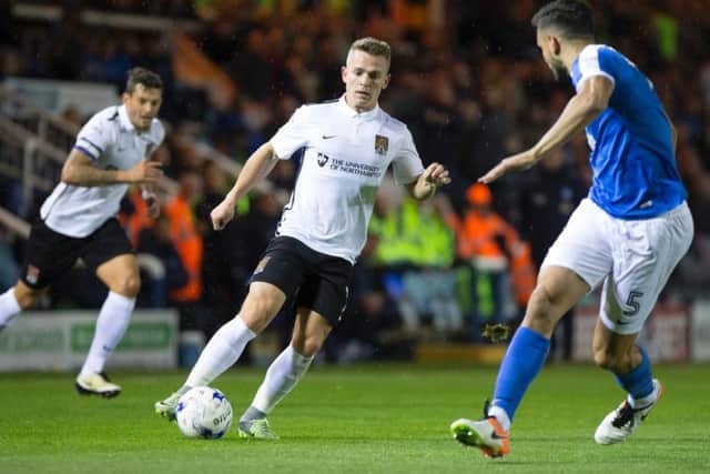 Sam Hoskins on an attacking run during Tuesday night's clash at Peterborough United (Pictures: Kirsty Edmonds)