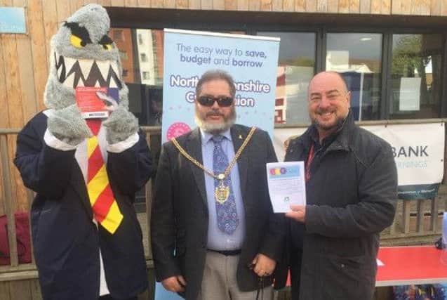 The mayor of Northampton, councillor Christopher Malpas with development officer at the Northamptonshire credit union, Sean Silver NNL-161021-125145001