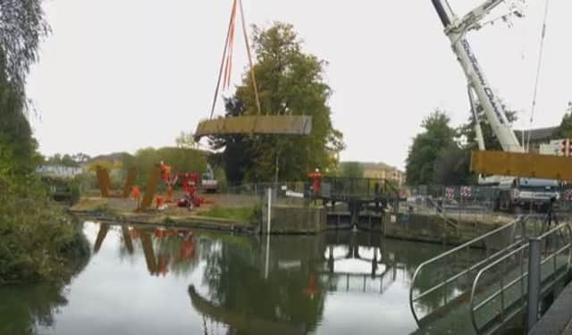 A footbridge has been put in place over the River Nene from the University of Northampton's new campus to Delapre