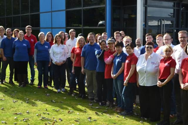 Some of the team at Gilt Edged, wearing the new branded clothing